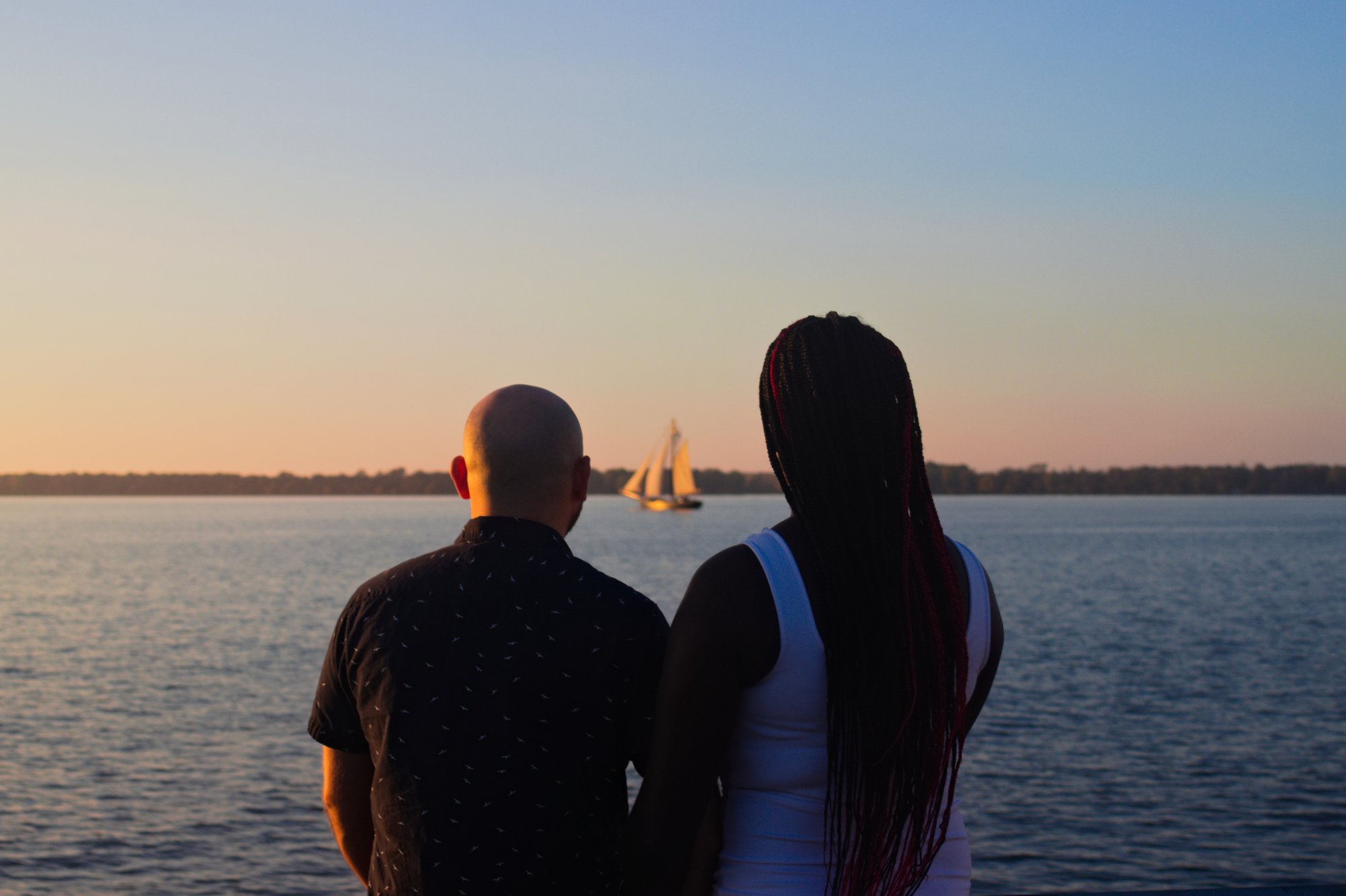 Couple pier sunset